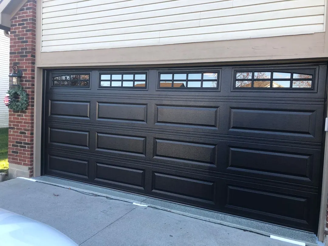 Dark brown door with a row of windows